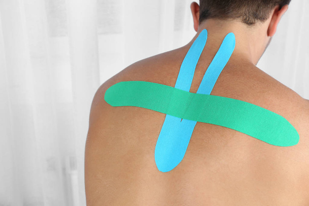 back with applied physio tape - Photo, Image