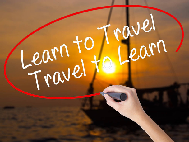 Woman Hand Writing Learn to Travel - Foto, imagen
