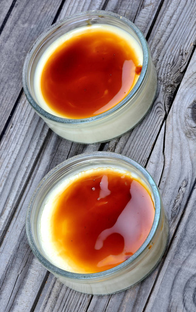 Creme brulee in a porcelain bowls  - Photo, Image