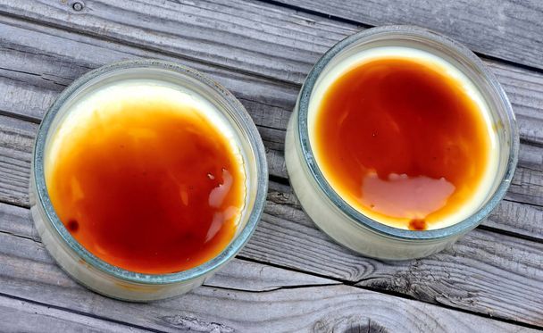 Bowls with creme brulee on table - Photo, Image