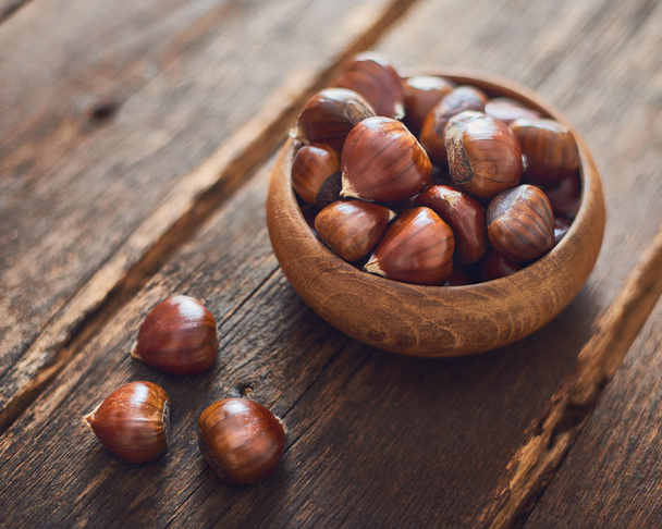 Chestnuts in wooden bowl - Photo, Image