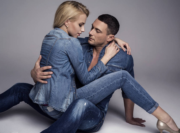 Beautiful couple wear fashionable jeans clothes  - Фото, изображение