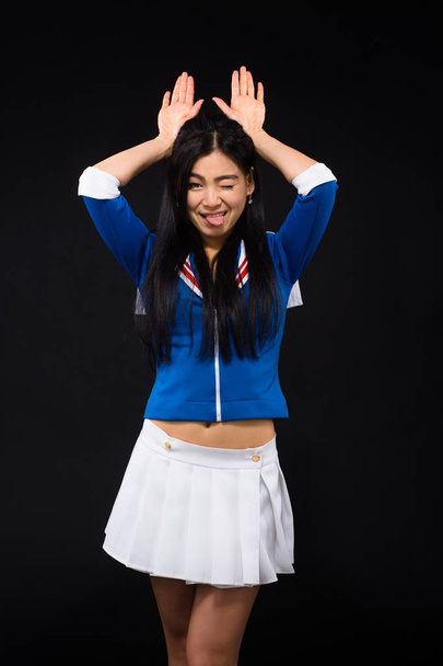 Asian woman expressing emotions in studio - Photo, Image
