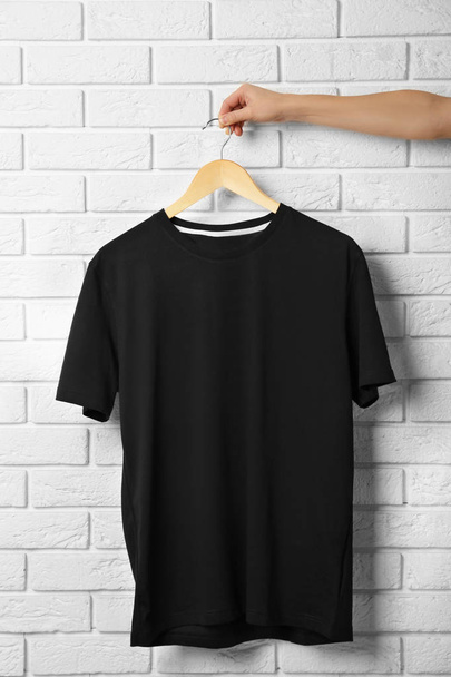 Blank black t-shirt - Foto, Bild