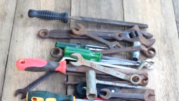 Old working tools on wooden background,tilt down - Footage, Video