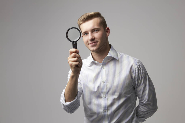 Criminologist With Magnifying Glass - Foto, Imagen