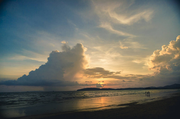 Beautiful sunset with great clouds on the sea - Fotoğraf, Görsel