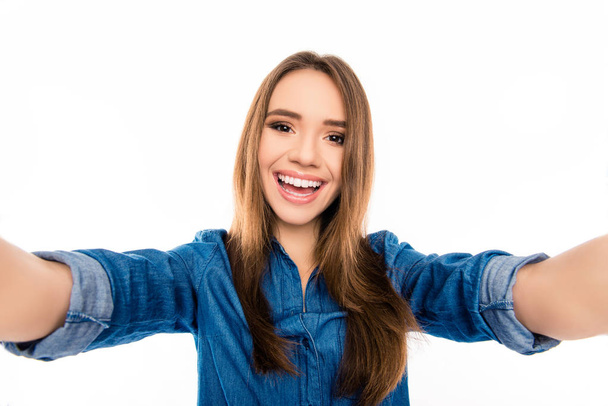 Pretty positive cheerful young woman making selfie - Zdjęcie, obraz