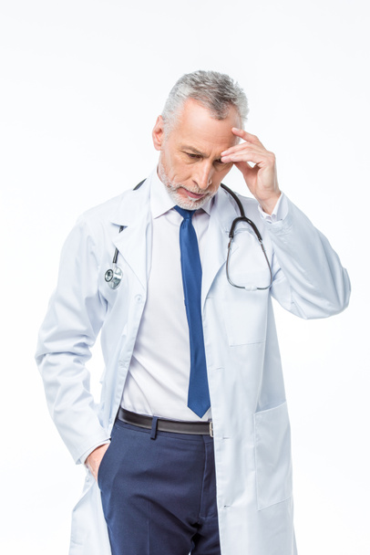 Mature doctor with stethoscope  - Valokuva, kuva