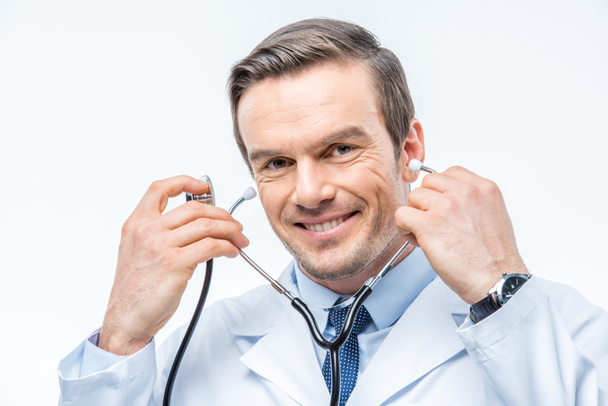 Male doctor with stethoscope - Фото, изображение
