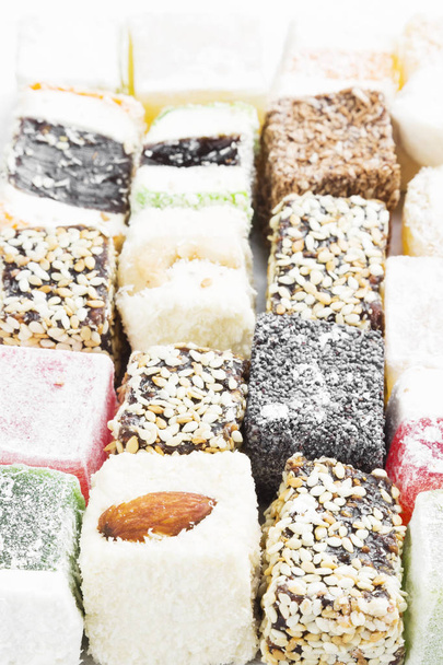 Various Turkish sweets with nuts, coco, sesame - Photo, image