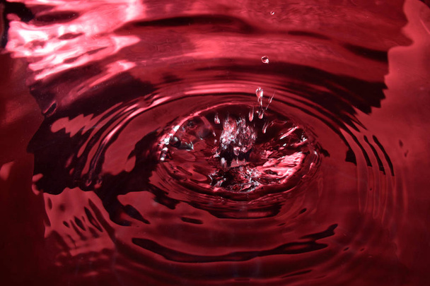 beautiful drop of water which fell into the water - 写真・画像