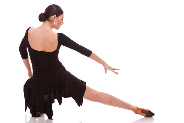 gyönyörű salsa táncos a szúrást pózol - Fotó, kép
