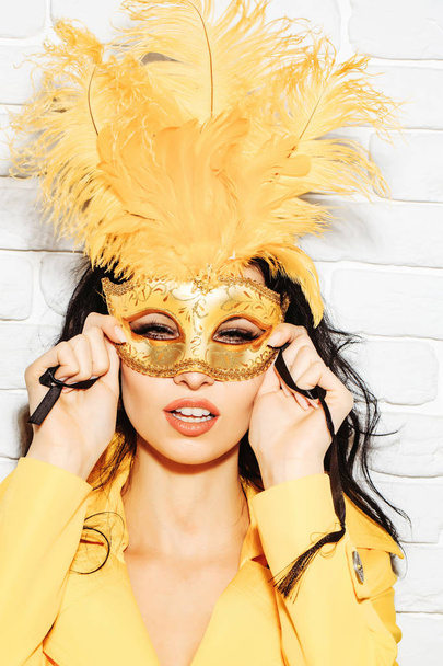 Pretty girl in carnival mask - Foto, imagen