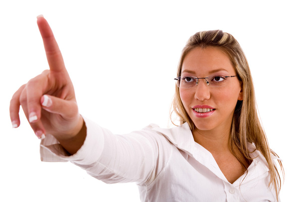 Portrait of businesswoman pointing - Фото, зображення