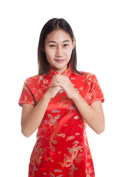 Asian girl in chinese cheongsam dress with gesture of congratula - Foto, imagen