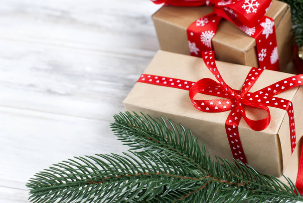 Christmas boxes, fir branches,  cones, Christmas decorations - Fotó, kép