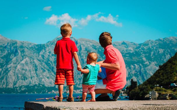 father with two kids travel in Montenegro - Foto, Bild