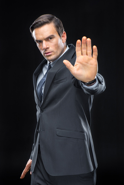Handsome businessman gesturing - Zdjęcie, obraz