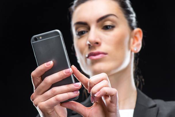 Businesswoman using smartphone - Zdjęcie, obraz