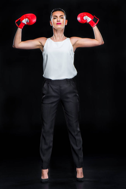 Businesswoman in boxing gloves - Valokuva, kuva