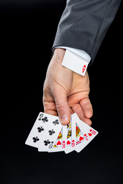 muž hospodářství hrací karty - Fotografie, Obrázek