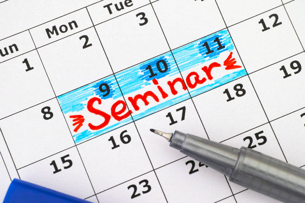 Reminder Seminar in calendar with blue pen - Fotoğraf, Görsel