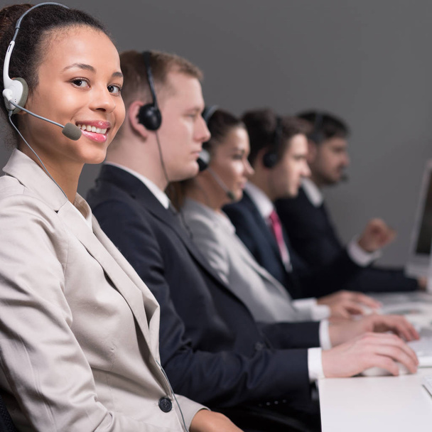 Call center agent with colleagues - Photo, Image
