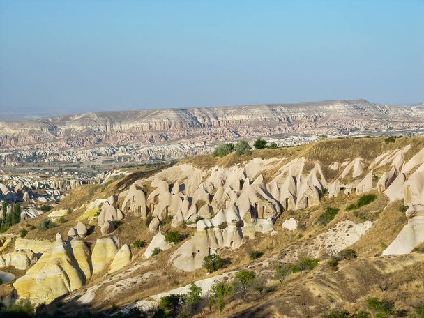 Volcanic cliffs and rock formations at Cappadocia - Photo, Image