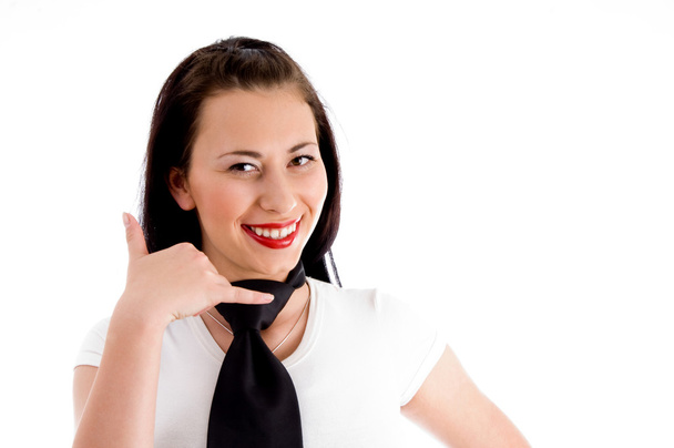 Woman making call gesture and smiling - Photo, Image