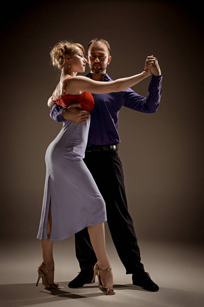 The man and the woman dancing argentinian tango - Фото, изображение