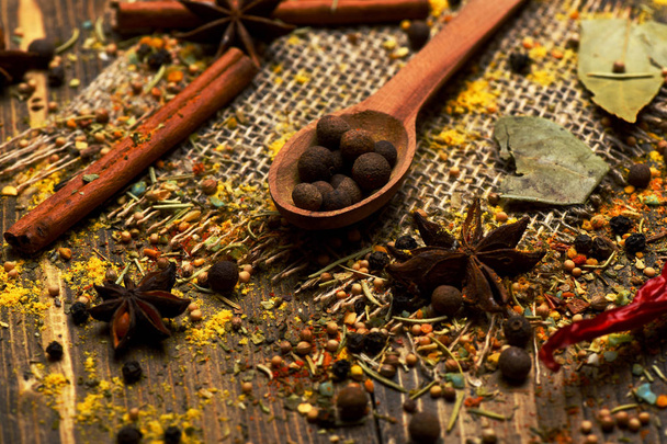 spicy fragrant spices in spoon - Foto, immagini