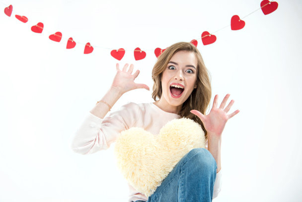 Woman with heart shaped pillow     - Photo, Image