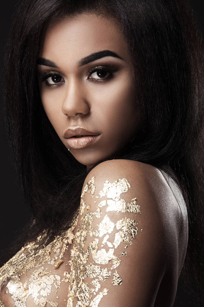 African American model covered with gold - Photo, Image