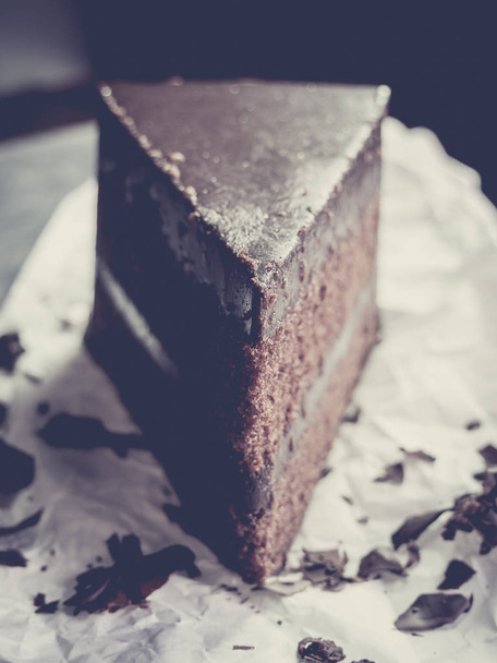 close up dark chocolate fudge cake with vintage filter - Foto, Imagem