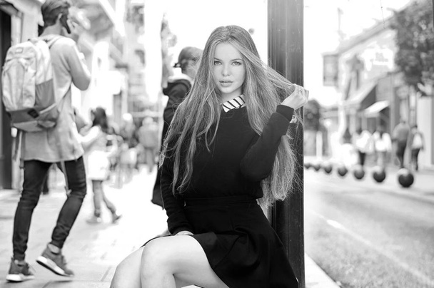 Young pretty trendy caucasian girl posing at the Europe city - Photo, image