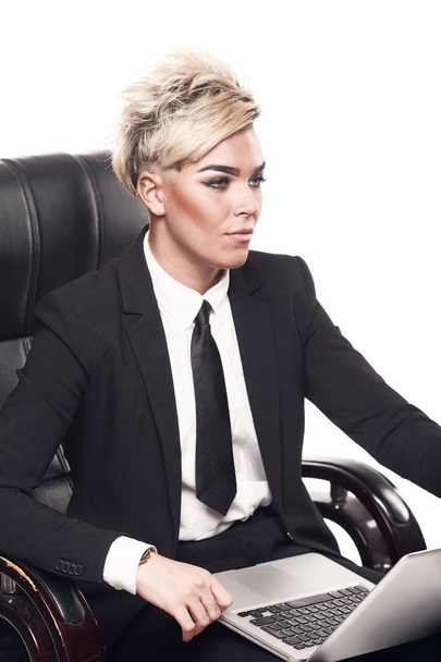 Blond beautiful business lady in black suit - Foto, Bild
