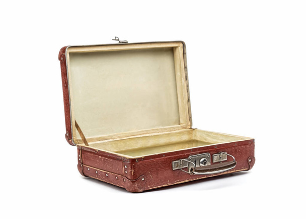 Old vintage suitcase opened front isolated on white - Foto, Bild