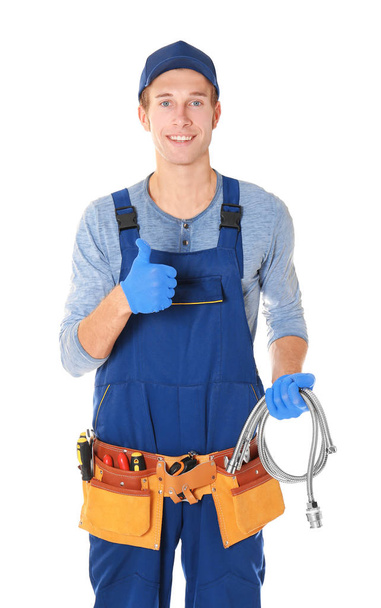 young handsome plumber  - Foto, afbeelding