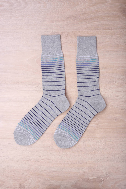 Nové ponožky na dřevěném pozadí - Fotografie, Obrázek