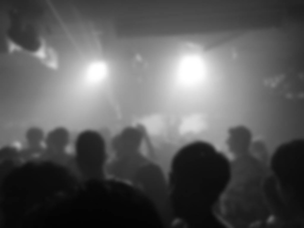 Crowd peoples dancing with DJ music in nightclub - Foto, Imagem