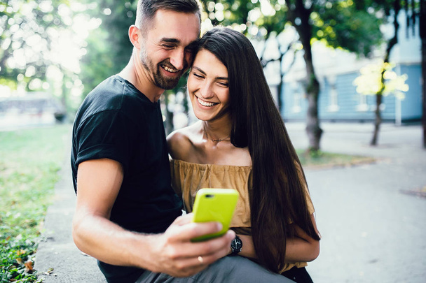 Beautiful young couple makes selfie - Photo, Image