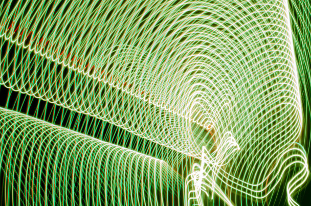 Bulanık sihirli neon ışık ışık efektleri eğri çizgiler - Fotoğraf, Görsel