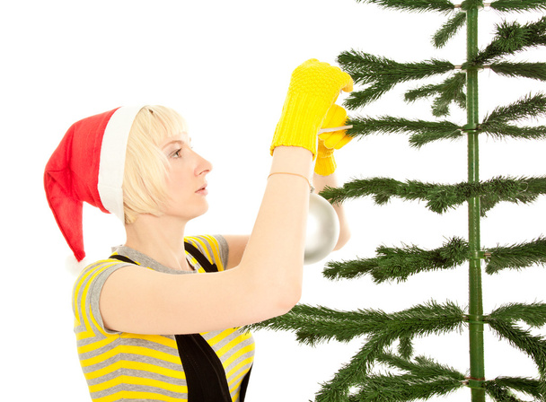Woman in yellow gloves with fir - Foto, afbeelding
