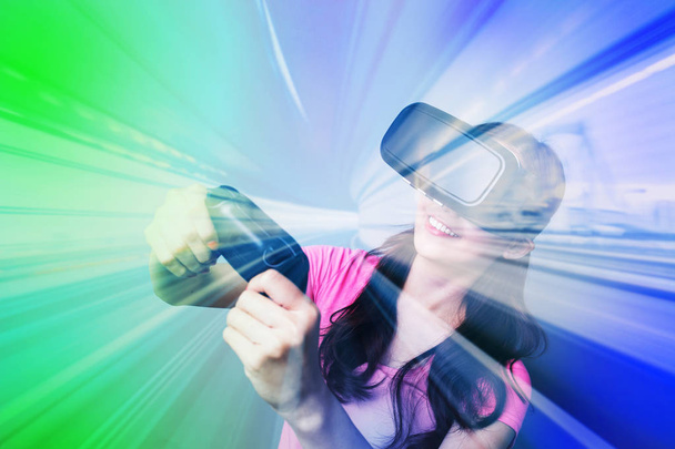  woman playing with  VR-headset  - 写真・画像