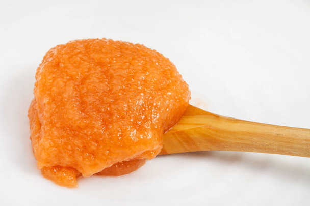 salty caviar of common carp in wooden spoon - Photo, Image