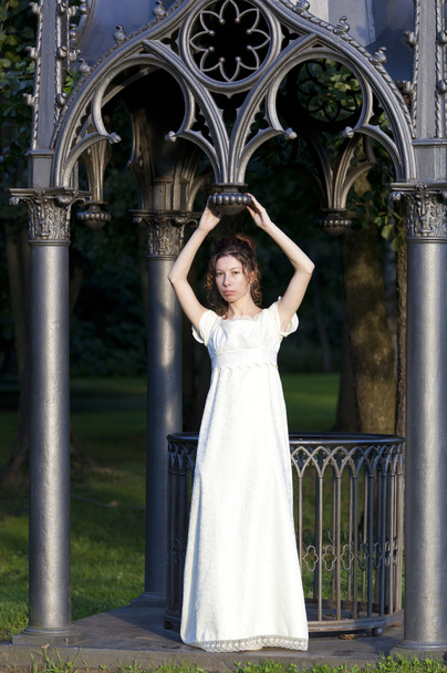 Young girl in a long white dress - 写真・画像
