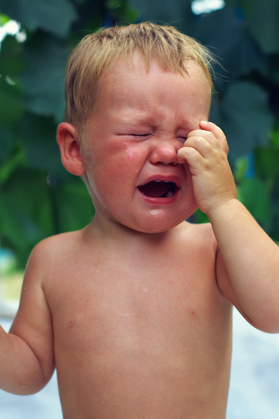 Close-up of upset little baby boy crying outdoors - Фото, зображення
