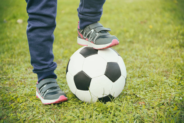 boy's legs and ball - Photo, Image