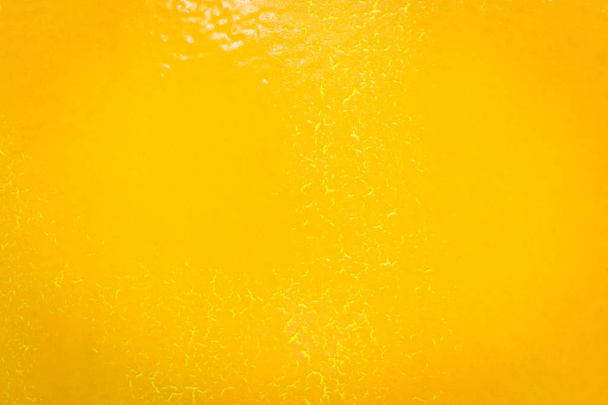 Orange wall with stained paint breaking out texture background. - Photo, Image
